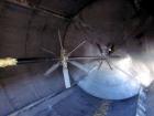 Used Tank, 6200 Gallon, 304 Stainless Steel, Vertical. 108” Diameter x 156” straight side, flat top, coned bottom. Top entering agitator with a shaft and (2) (6) blade turbines, driven by a 7.5hp mot...
