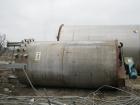 Used Tank, 5500 Gallon, 304 Stainless Steel, Vertical. 96” Diameter x 192” straight side, flat top, coned bottom. Fixed carbon steel agitator bridge with a top entering Chemineer agitator, 4 blade tu...