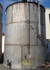 Used - Tank, 20,000 Gallon, 14' diameter x 18' high on straight side. Vertical, Constructed T304 Stainless steel, Flat bottom, Cone top, manhole on side near bottom and top.