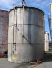 Used - Tank, 20,000 Gallon, 14' diameter x 18' high on straight side. Vertical, Constructed T304 Stainless steel, Flat bottom, Cone top, manhole on side near bottom and top.