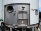 Used 7,200 Gallon Stainless Steel Tank. Approximately 14' tall (with stands approximately 17'), 10' diameter, 2 x 4ft. jackets for glycol / coolant. Cooling channels built into floor. Inverted cone f...