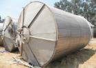 Used Tank, Approximate 12,000 Gallon, Stainless Steel tank, Vertical. Approximately 11' diameter x 16' straight side, cone top with 2” diameter center top opening, 20” diameter top manway and 4” diam...