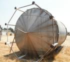 Used Tank, Approximate 12,000 Gallon, Stainless Steel tank, Vertical. Approximately 11' diameter x 16' straight side, cone top with 2” diameter center top opening, 20” diameter top manway and 4” diam...