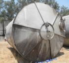 Used Tank, Approximate 12,000 Gallon, Stainless Steel tank, Vertical. Approximately 11' diameter x 16' straight side, cone top with 2” diameter center top opening, 20” diameter top manway and 4” diam...