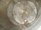 Used Tank, Approximate 12,000 Gallon, Stainless Steel tank, Vertical. Approximately 11' diameter x 16' straight side, cone top with 2” diameter center top opening, 20” diameter top manway and 4” diam...