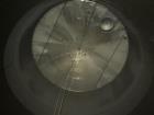 Used Tank, Approximate 12,000 Gallon, Stainless Steel tank, Vertical. Approximately 11' diameter x 16' straight side, cone top with 2” diameter center top opening, 20” diameter top manway and 4” diam...