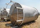 Used Tank, Approximate 12,000 Gallon, Stainless Steel tank, Vertical. Approximately 11' diameter x 16' straight side, cone top with 2” diameter center top opening, 20” diameter top manway and 4” diam...