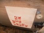 Used Tank, Approximate 12,000 Gallon, Stainless Steel tank, Vertical. Approximately 11' diameter x 16' straight side, cone top with 2” diameter center top opening, 20” diameter top manway and 4” diam...