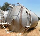 Used Tank, Approximate 12,000 Gallon, Stainless Steel tank, Vertical. Approximately 11' diameter x 16' straight side, cone top with 2” diameter center top opening, 20” diameter top manway and 4” diam...