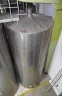 Used Tank, Approximate 19,500 Gallon, 14 Gauge Stainless steel, Vertical. Approximate 130” diameter x 336” straight side, coned top, 7” sloped bottom. Openings top 16” man way with cover and approxim...