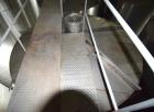 Used Tank, Approximate 19,500 Gallon, 14 Gauge Stainless steel, Vertical. Approximate 130” diameter x 336” straight side, coned top, 7” sloped bottom. Openings top 16” man way with cover and approxim...