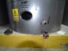 Used Tank, Approximate 19,500 Gallon, 14 Gauge Stainless steel, Vertical. Approximate 130” diameter x 336” straight side, coned top, 7” sloped bottom. Openings top 16” man way with cover and approxim...