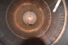 Used Tank, Approximate 19,500 Gallon, 14 Gauge Stainless steel, Vertical. Approximate 130” diameter x 336” straight side, coned top, 7” sloped bottom. Openings top 16” man way with cover and approxim...
