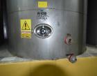 Used Tank, Approximate 19,500 Gallon, 14 Gauge Stainless steel, Vertical. Approximate 130” diameter x 336” straight side, coned top, 7” sloped bottom. Openings top 16” man way with cover and approxim...