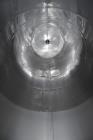 Used Tank, Approximate 19,500 Gallon, 14 Gauge Stainless steel, Vertical. Approximate 130” diameter x 336” straight side, coned top, 7” sloped bottom. Openings top 16” man way with cover and approxim...