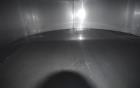 Used Tank, Approximate 19,500 Gallon, 14 Gauge Stainless steel, Vertical. Approximate 130” diameter x 336” straight side, coned top, 7” sloped bottom. Openings top 16” man way with cover and approxim...