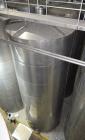 Used Tank, Approximate 19,500 Gallon, 14 Gauge Stainless steel, Vertical. Approximate 130” diameter x 336” straight side, coned top, 7” sloped bottom. Openings top 16” man way with cover and approxim...