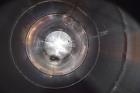 Used Tank, Approximate 19,500 Gallon, 14 Gauge Stainless steel, Vertical. Approximate 130” diameter x 336” straight side, coned top, 7” sloped bottom. Openings top 16” man way with cover and approxim...