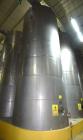 Used Tank, Approximate 19,500 Gallon, 14 Gauge Stainless steel, Vertical. Approximate 130” diameter x 336” straight side, coned top, 7” sloped bottom. Openings top 16” man way with cover and approxim...