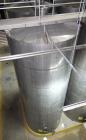 Used Tank, Approximate 19,500 Gallon, 14 Gauge Stainless steel, Vertical. Approximate 130” diameter x 336” straight side, coned top, 7” sloped bottom. Openings top 16” man way with cover and approxim...