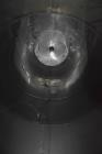 Used Tank, Approximate 19,500 Gallon, 14 Gauge Stainless steel, Vertical. Approximate 130” diameter x 336” straight side, coned top, 7” sloped bottom. Openings top 16” man way with cover and approxim...