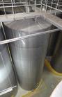 Used Tank, Approximate 19,500 Gallon, 14 Gauge Stainless steel, Vertical. Approximate 130” diameter x 336” straight side, coned top, 7” sloped bottom. Openings top 16” man way with cover and approxim...