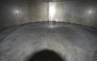 Used Tank, Approximate 19,500 Gallon, 14 Gauge Stainless steel, Vertical. Approximate 130” diameter x 336” straight side, coned top, 7” sloped bottom. Openings top 16” man way no cover and approximat...