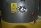 Used Tank, Approximate 19,500 Gallon, 14 Gauge Stainless steel, Vertical. Approximate 130” diameter x 336” straight side, coned top, 7” sloped bottom. Openings top 16” man way with cover and approxim...