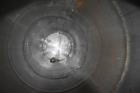 Used Tank, Approximate 19,500 Gallon, 14 Gauge Stainless steel, Vertical. Approximate 130” diameter x 336” straight side, coned top, 7” sloped bottom. Openings top 16” man way with cover and approxim...