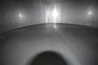 Used Tank, Approximate 19,500 Gallon, 14 Gauge Stainless steel, Vertical. Approximate 130” diameter x 336” straight side, coned top, 7” sloped bottom. Openings top 16” man way with cover and approxim...