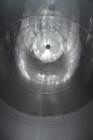 Used Tank, Approximate 19,500 Gallon, 14 Gauge Stainless steel, Vertical. Approximate 130” diameter x 336” straight side, coned top, 7” sloped bottom. Openings top 16” man way with cover and approxim...