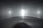 Used Tank, Approximate 19,500 Gallon, 14 Gauge Stainless steel, Vertical. Approximate 130” diameter x 336” straight side, coned top, 7” sloped bottom. Openings top 16” man way with cover and approxim...