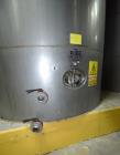 Used Tank, Approximate 19,500 Gallon, 14 Gauge Stainless steel, Vertical. Approximate 130” diameter x 336” straight side, coned top, 7” sloped bottom. Openings top 16” man way with cover and approxim...