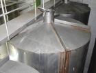 Used Tank, Approximate 19,500 Gallon, 14 Gauge Stainless steel, Vertical. Approximate 130” diameter x 336” straight side, coned top, 7” sloped bottom. Openings top 16” man way with cover and approxim...