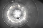 Used Tank, Approximate 19,500 Gallon, 14 Gauge Stainless steel, Vertical. Approximate 130” diameter x 336” straight side, coned top, 7” sloped bottom. Openings top 16” man way with cover and approxim...