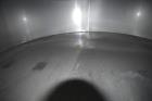 Used Tank, Approximate 19,500 Gallon, 14 Gauge Stainless steel, Vertical. Approximate 130” diameter x 336” straight side, coned top, 7” sloped bottom. Openings top 16” man way with cover and approxim...