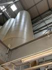 Holvrieka vertical tank, Total capacity 33597 gallon/127000 liter, working capacity 33333 gallon/126000 liter. 304 stainless steel on product contact parts. Jacketed rated for 30 PSI (2 bar) 124