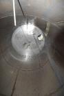 Used- Tank, 8,000 Gallon, Stainless Steel, Vertical. Approximate 112