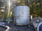 Used 10,000 Gallon Vertical Stainless Steel Tank. 316L Stainless Steel. Approximately 12' diameter x 12' tall. Side manways. Flat top. Refurbished 1995.