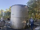 Used 10,000 Gallon Vertical Stainless Steel Tank. 316L Stainless Steel. Approximately 12' diameter x 12' tall. Side manways. Flat top. Refurbished 1995.