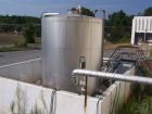 USED: 7500 gallon, 304 stainless steel, vertical tank. Slight dishtop, flat bottom, 10' diameter x 13' overall height, insul...