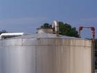 USED: 7500 gallon, 304 stainless steel, vertical tank. Slight dishtop, flat bottom, 10' diameter x 13' overall height, insulated.Last used to store latex.
