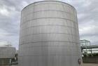 Used Approximate 216,000 gallons Stainless Steel Storage Tank With Philadelphia 40 HP Side Mount Agitator. T-1010. Flat top and Bottom. Misc. inlets Side bottom. Side Bottom Manway.