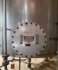 Used Approximate 9000 gallon Stainless Steel Storage Tank With 5 HP Centrifugal Pump, V-4780. approximate 120' X 15' T/T. Misc. top inlets. Cone bottom with center bottom outlet. Bottom side manway. ...