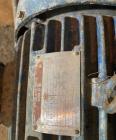 Used Approximate 9000 gallon Stainless Steel Storage Tank With 5 HP Centrifugal Pump, V-4780. approximate 120' X 15' T/T. Misc. top inlets. Cone bottom with center bottom outlet. Bottom side manway. ...