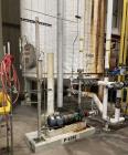 Used Approximate 8,680 gallon 316L Stainless Steel Agitated Tank With Goulds Centrifugal Pump. V-4508, P-4203.  Atmos. at 212 degrees F internal pressure. Top entering Agitator (HP unknown). Cone bot...