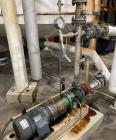 Used Approximate 8,680 gallon 316L Stainless Steel Agitated Tank With Goulds Centrifugal Pump. V-4508, P-4203.  Atmos. at 212 degrees F internal pressure. Top entering Agitator (HP unknown). Cone bot...