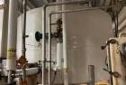 Used Approximate 6,000 gallon Stainless Steel Tank With A Worthington 7.5 HP Centrifugal Pump, V-1110. approximate 6000 gallon Flat top with misc. inlets. Cone bottom with center bottom outlet. Worth...