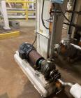 Used Approximate 6,000 gallon Stainless Steel Tank With A Worthington 7.5 HP Centrifugal Pump, V-1110. approximate 6000 gallon Flat top with misc. inlets. Cone bottom with center bottom outlet. Worth...