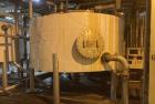 Used Approximate 5200 gallon Stainless Steel Mixing Tank. 12C. Includes centrifugal pump.
